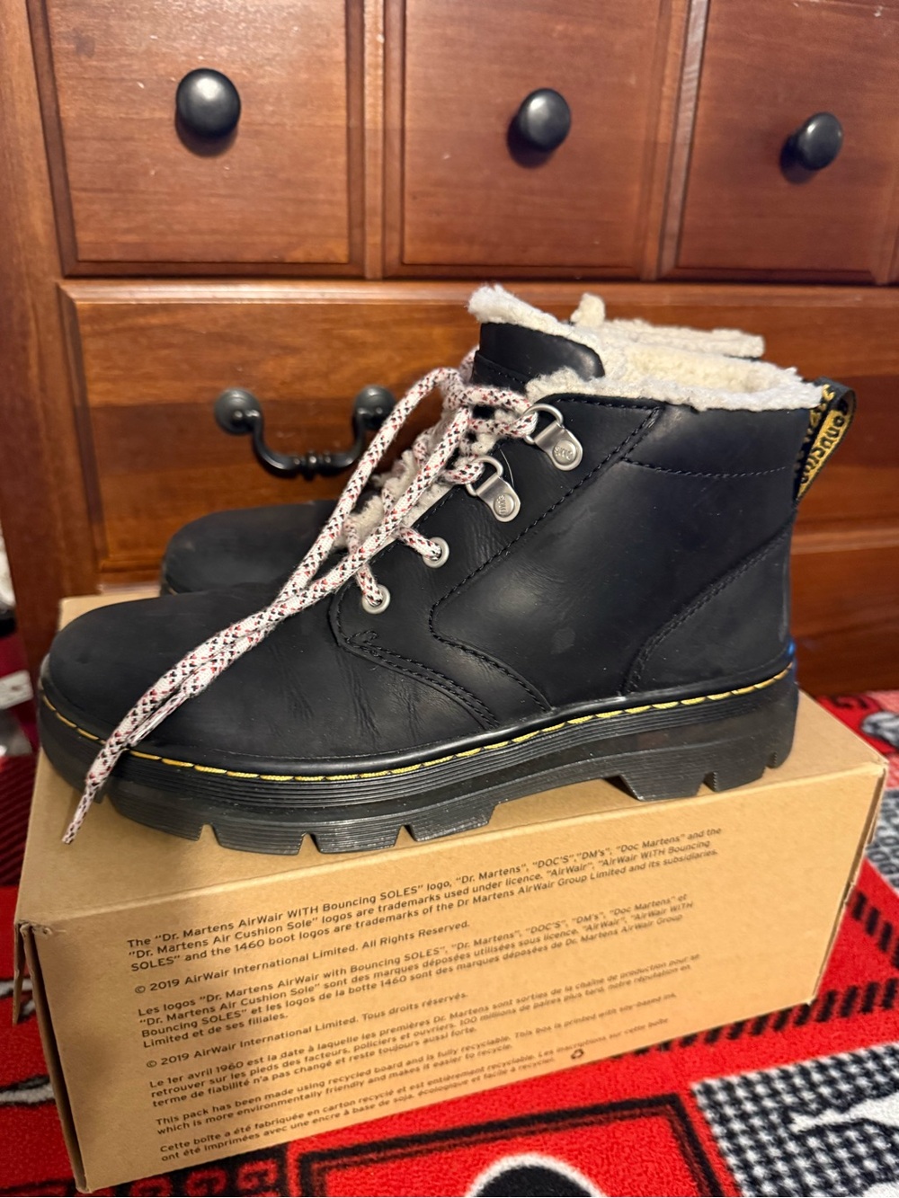Doc Marten Black Shearling-Lined Lace-Up Boots with Yellow Stitching